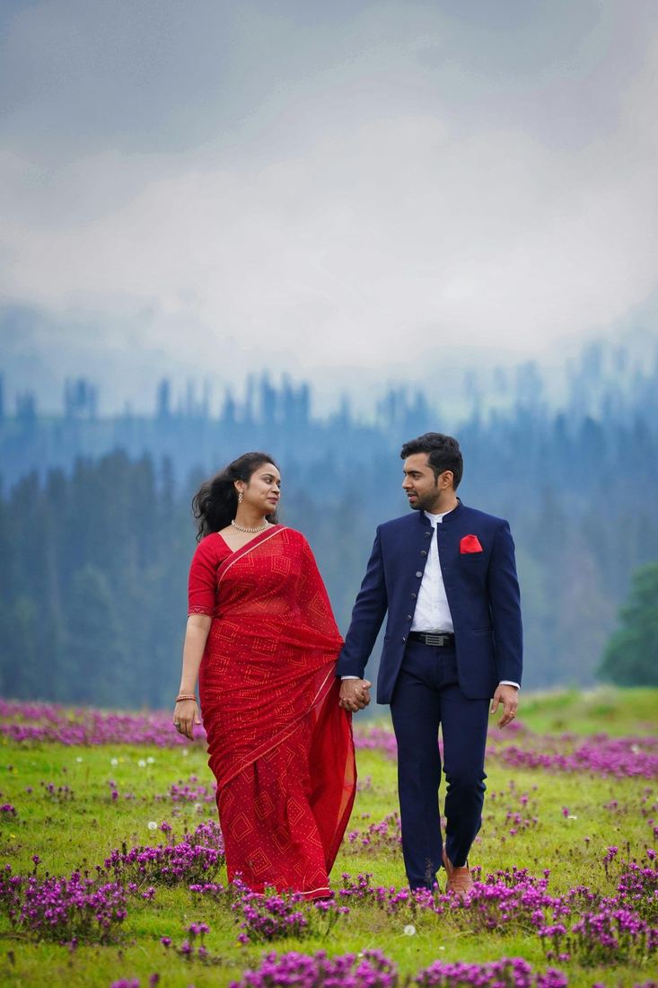 Couple in a flower meadow in Kashmir