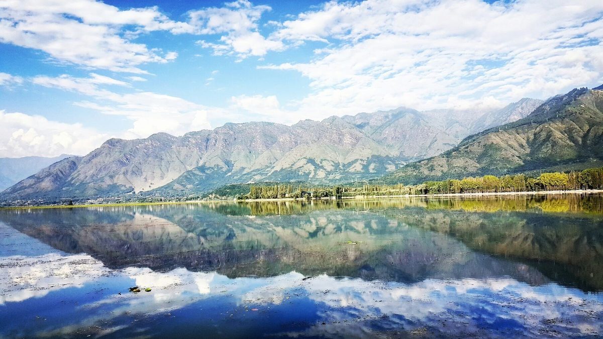 Dal Lake Srinagar with houseboats and mountains