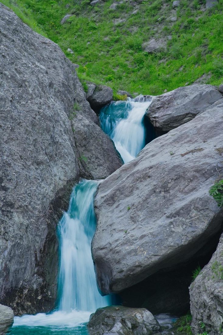 Mountain waterfall among rocks in Kashmir